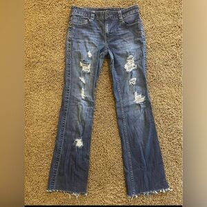 Size 6 women’s Calvin Klein ripped distressed blue jeans boot cut